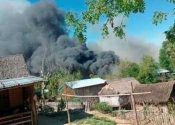 Images posted on social media show the fire in Kin Ma village