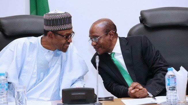 L-R; President Muhammadu Buhari - Mr Godwin Emefiele