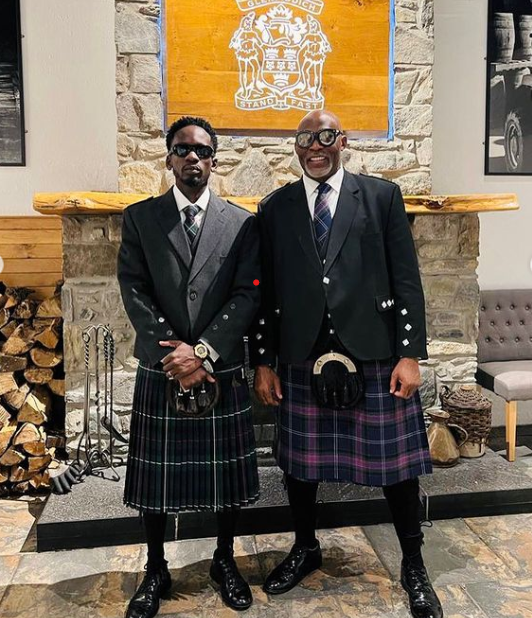 RMD creates buzz as he twins skirt with Mr Eazi