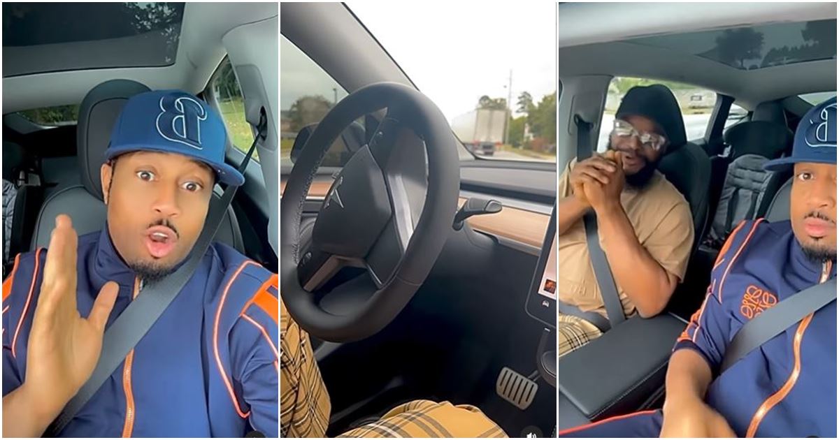 “Hold that thing!” – Mike Ezuruonye cries out as friend leaves Telsa Car steering, sets vehicle on auto-drive