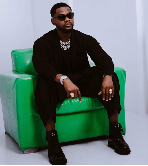 Kizz Daniel slams troll for comparing him with Wizkid