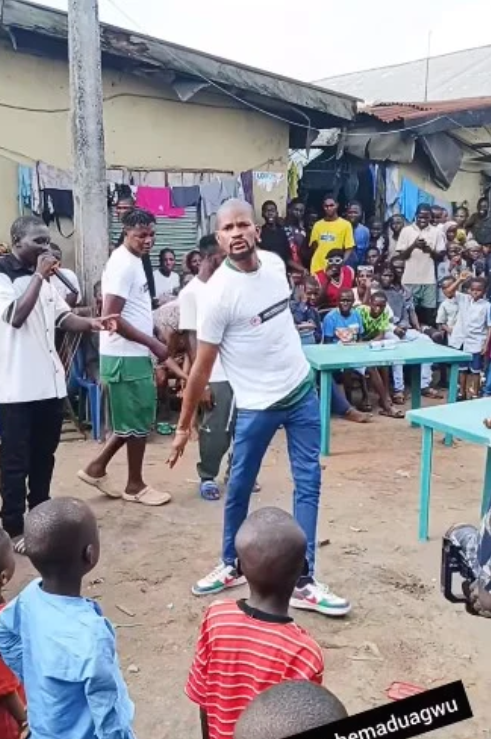 Uche Maduagwu dances with Joy as Tonto Dikeh feeds thousands of children in Lagos