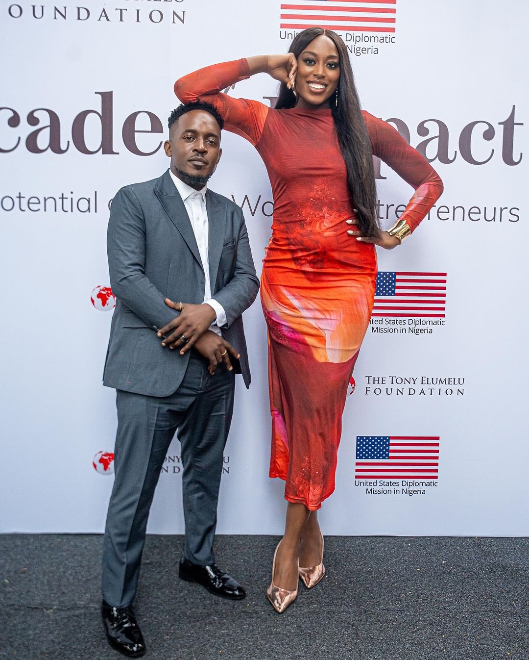 Fans furious over MI Abaga’s pose with basketballer Chiney Ogwumike