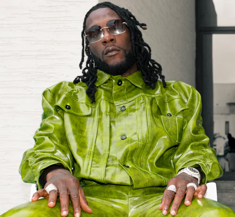 Burna Boy sets internet ablaze with acquisition of new Ferrari Purosangue worth N1.8 Billion