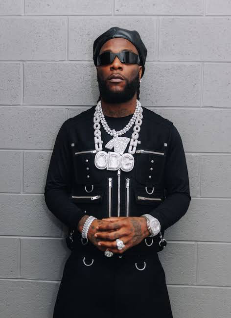 Burna Boy gifts N4 million to MC after joking about being Cubana Chief Priest’s abandoned brother