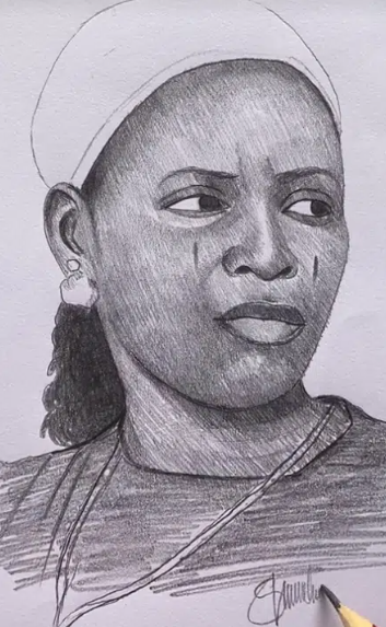 Street artist surprises Kuli Kuli vendor with her portrait and cash gift