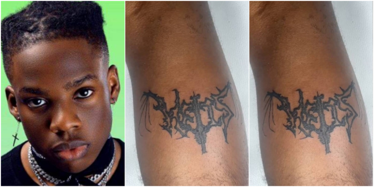 fan celebrates Rema’s new album release '''HEIS' with permanent tattoo