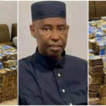 Viral photo shows Nigerian politician with stacks of cash in apartment