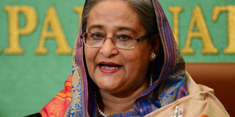 (FILES) Bangladesh Prime Minister Sheikh Hasina speaks at Japan's national press club in Tokyo on May 28, 2014. - Cheering protesters stormed Bangladeshi Prime Minister Sheikh Hasina's palace on August 5, 2024, after she fled, the culmination of more than a month of deadly anti-government protests. (Photo by YOSHIKAZU TSUNO / AFP)