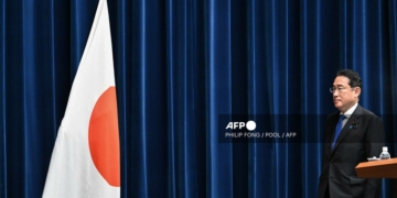 Japan's Prime Minister Fumio Kishida arrives to speak at a press conference at the prime minister's office in Tokyo on August 14, 2024. - Kishida confirmed on August 14 that he will not seek re-election as head of his party next month, meaning the end of his premiership. (Photo by Philip FONG / POOL / AFP)