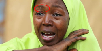 One of the parents of abducted Dapchi Schoolgirls weeping.