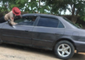 FRSC official jumps on moving car