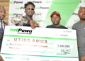 From left to Right: Managing Director/CEO, Mr. Segun Somefun, betPawa ambassador Mr. Eazi, a winner Utibe Amos and head information and technology Lagos state lottery board Mr. Remi Iwayemi during the official presentation of the cheque to the winner .