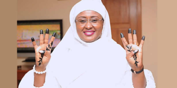 Aisha Buhari displays 4x4 tattoo for another four years of Buhari