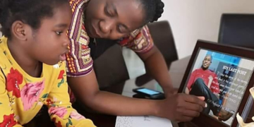 Mrs. Adesanmi and daughter