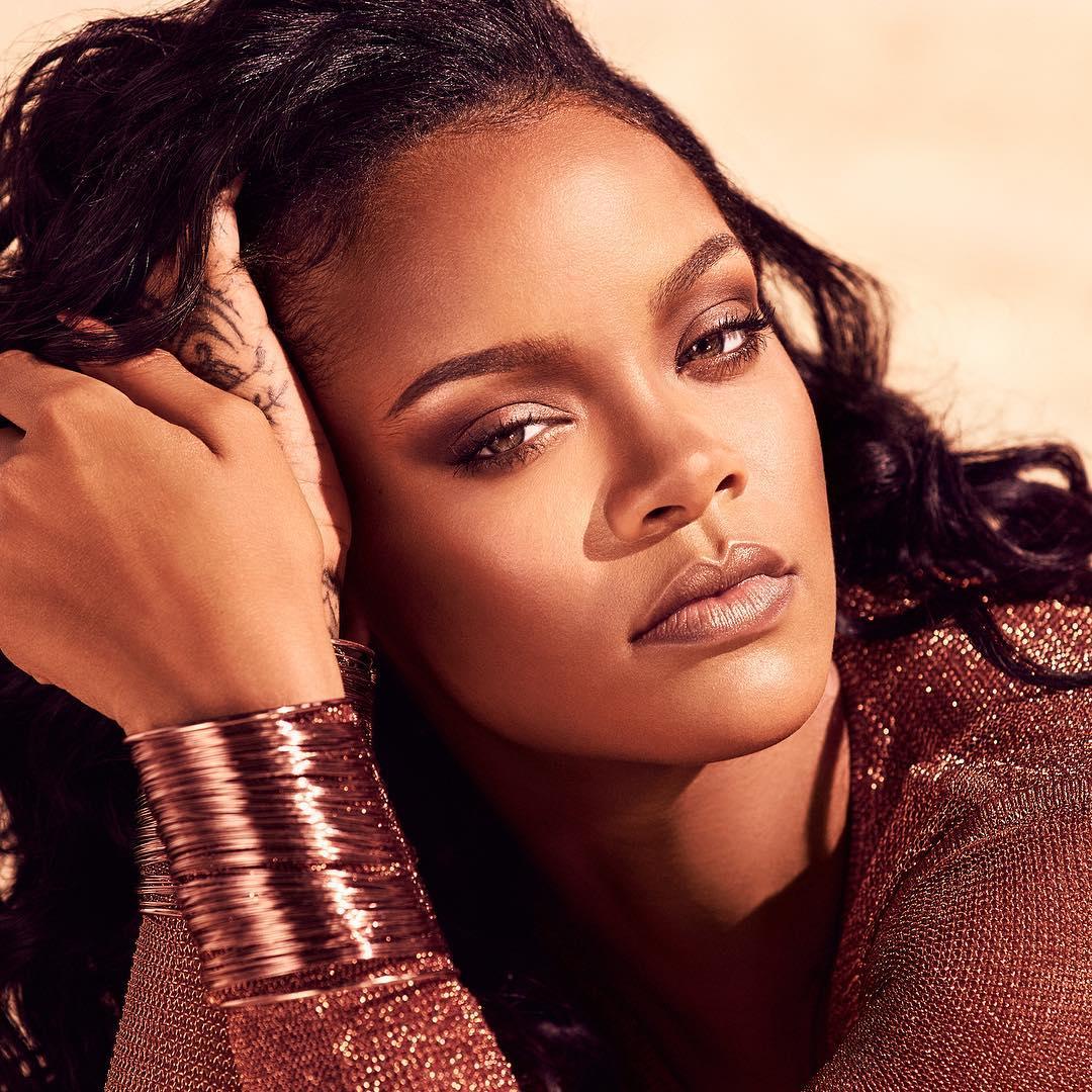 Rihanna Strikes Suggestive Pose In A Low Cut Leotard Photos