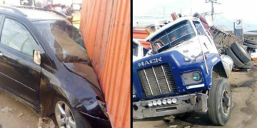 40 feet container crushes two vehicles loading passengers