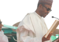 PRESIDENT MUHAMMADU BUHARI BEING SWORN IN BY THE CHIEF JUSTICE OF THE FEDERATION, JUSTICE MAHMUD MOHAMMED IN ABUJA