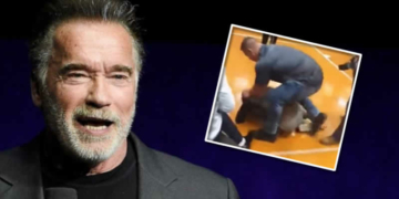 Arnold Schwarzenegger is dropped kicked in the back at an event in South Africa