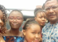 Tony Umez and his daughters