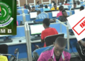 Students writing JAMB