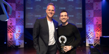 David Garcia holding his award