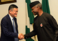 Vice President Yemi Osinbajo  (R) with  Executive Chairman, Alibaba Group Co-Founder, Mr Jack Ma (L)