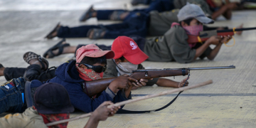 Cross section of Mexican kids taking precision shots