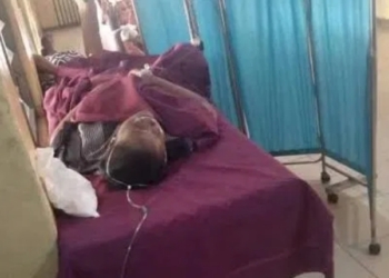 Picture of the female lawyer lying helplessly on hospital bed