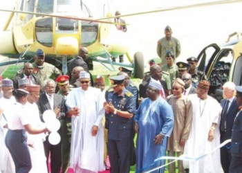 Former Governor of Sokoto State, Aliyu Magatakarda Wamakko (left); Minister of Defence, Maj.-Gen. Bashir Magashi (rtd.); Speaker, House of Representatives, Femi Gbajabiamila; President Mohammadu Buhari; Chief of the Air Staff, Air Marshal Sadique Abubakar; representative Kebbi South Senatorial District, Bala Na’Allah; Minister of Interior, Rauf Aregbesola and his Information and Culture counterpart, Lai Muhammed at the induction ceremony of Nigeria Air Force Combat Helicopters in Abuja on Thursday