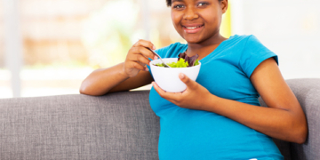 Pregnant woman eating