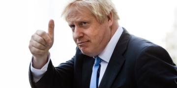 Update: Coronavirus stricken Boris Johnson 'improving' and 'sitting up in bed'