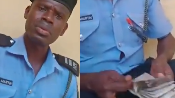 VIDEO: Police officer caught on video counting money after "extorting" 40,000 from a man has been arrested