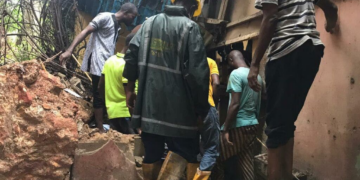 PHOTOS: Two die as storey building collapses in Lagos