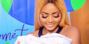 Regina Daniels shares official photos from baby's naming ceremony