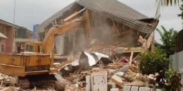 Enugu Govt demolishes house of man who pulled down Airport fence