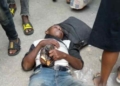 Man falls asleep near bridge in Lagos