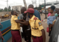 Pictures of LASTMA officials fighting passengers over N100 surface